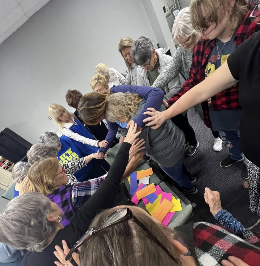 Prayer at women's gathering