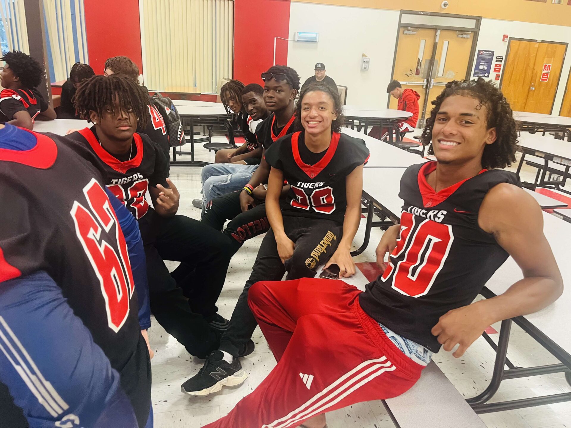 football players from Dunnello High School before the big game