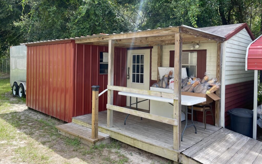 River Life Food Pantry in the red building on the west side of the church