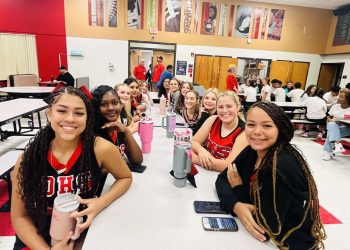 DHS Cheerleaders smile before the big game at school