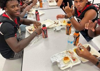 DHS Football players eat a big meal before the game